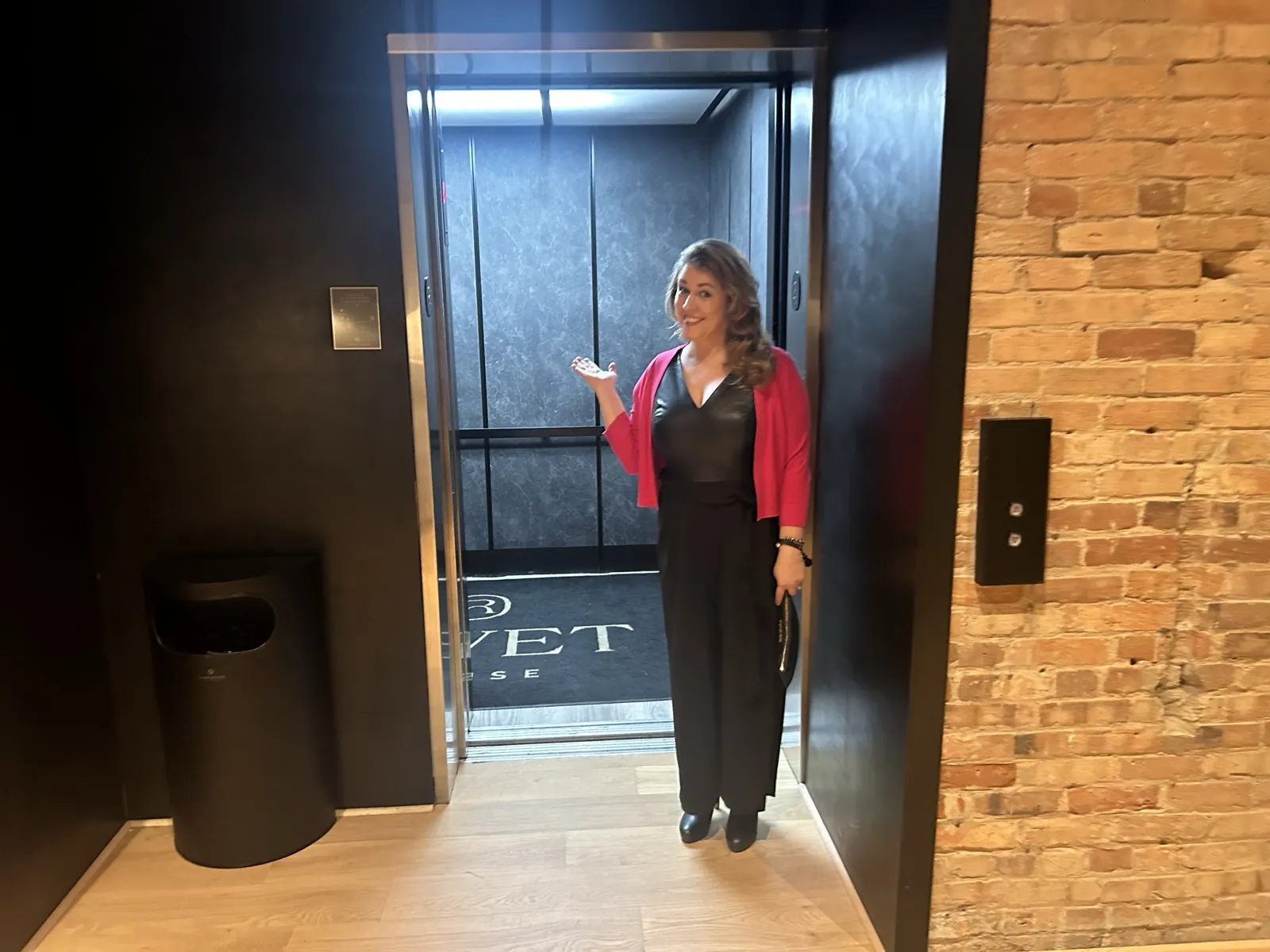 Finished elevator cab interior at Rivet House